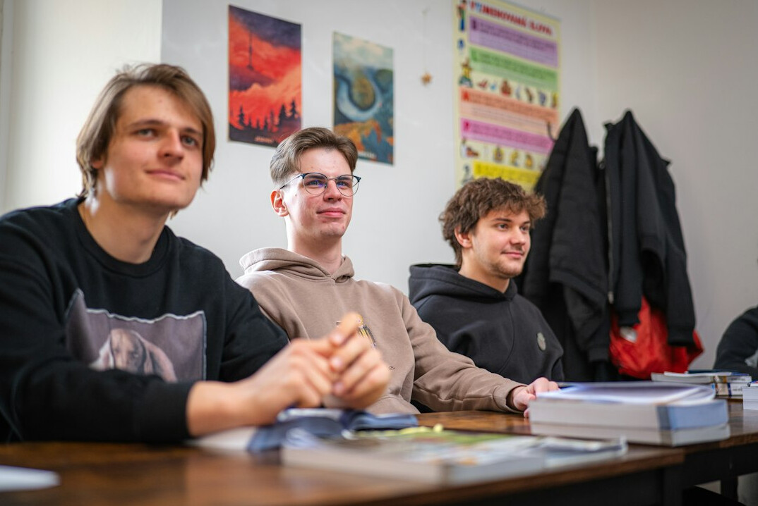 students learning programming in classroom