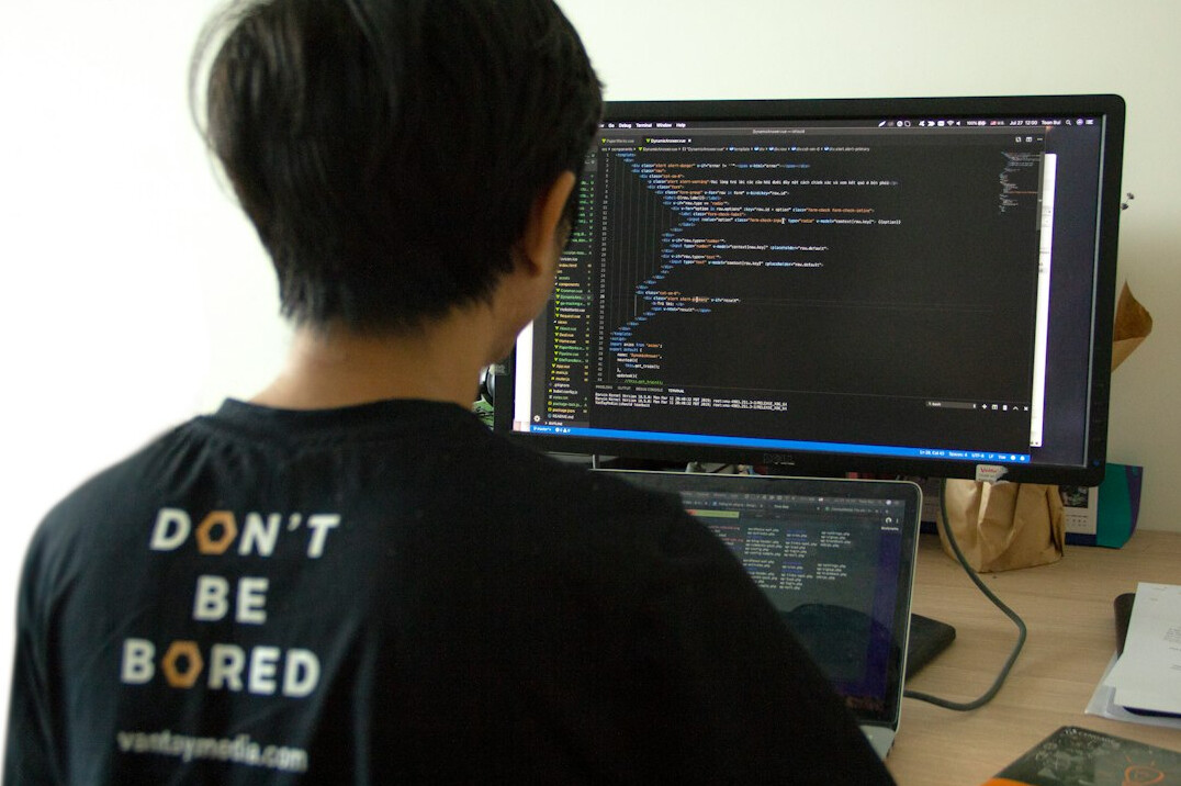 coding student with notebook