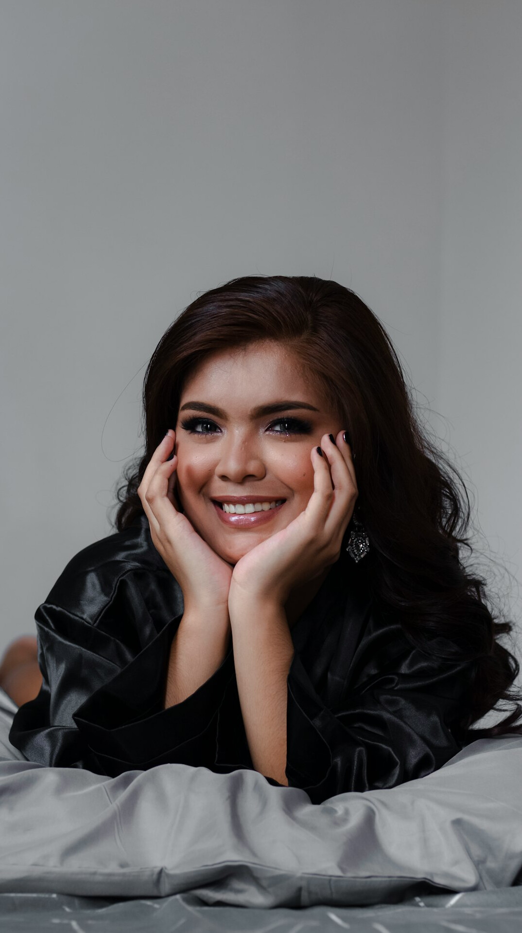 Portrait of a smiling businesswoman with dark hair