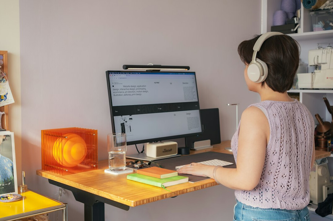 woman coding at home office